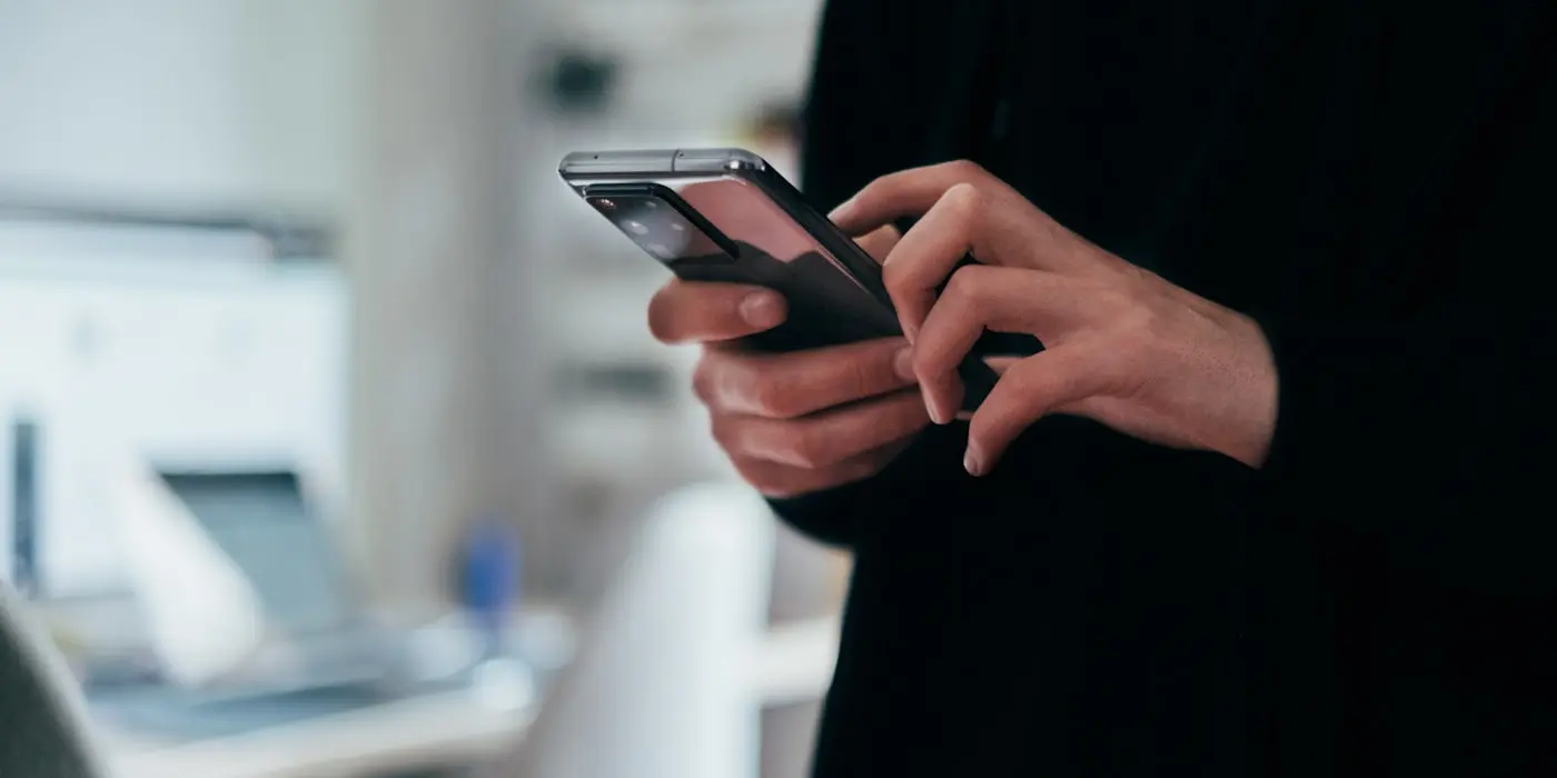 Someone answering a message on their phone